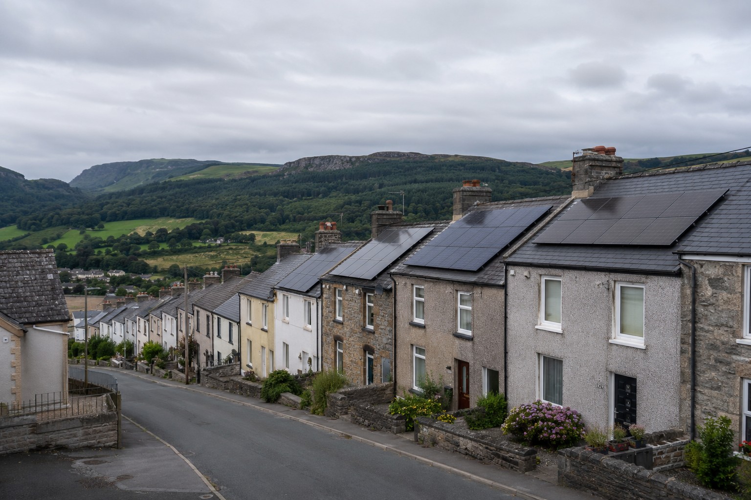 Terraced street in North Wales with solar panels on slate roofs