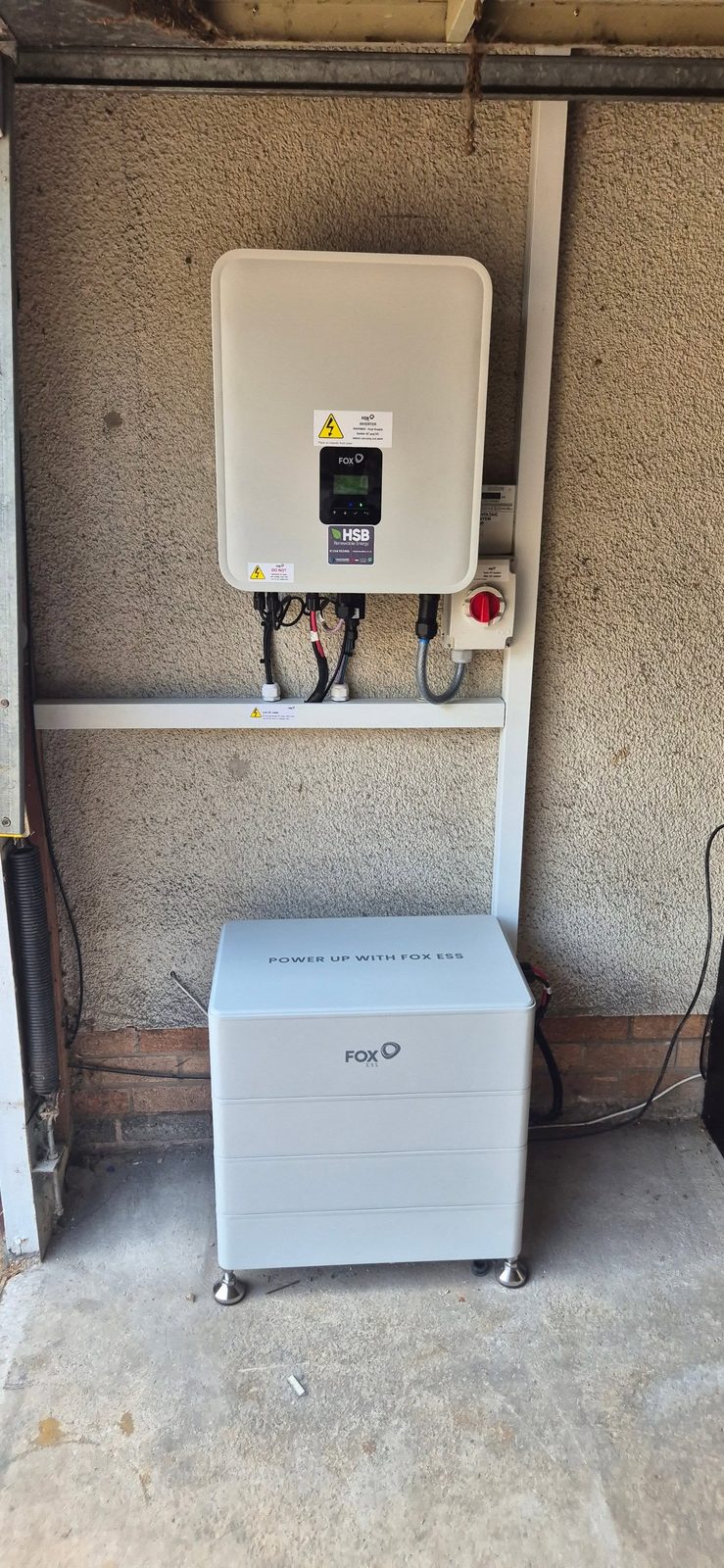 FoxESS inverter and battery storage cube installed in a Neston garage