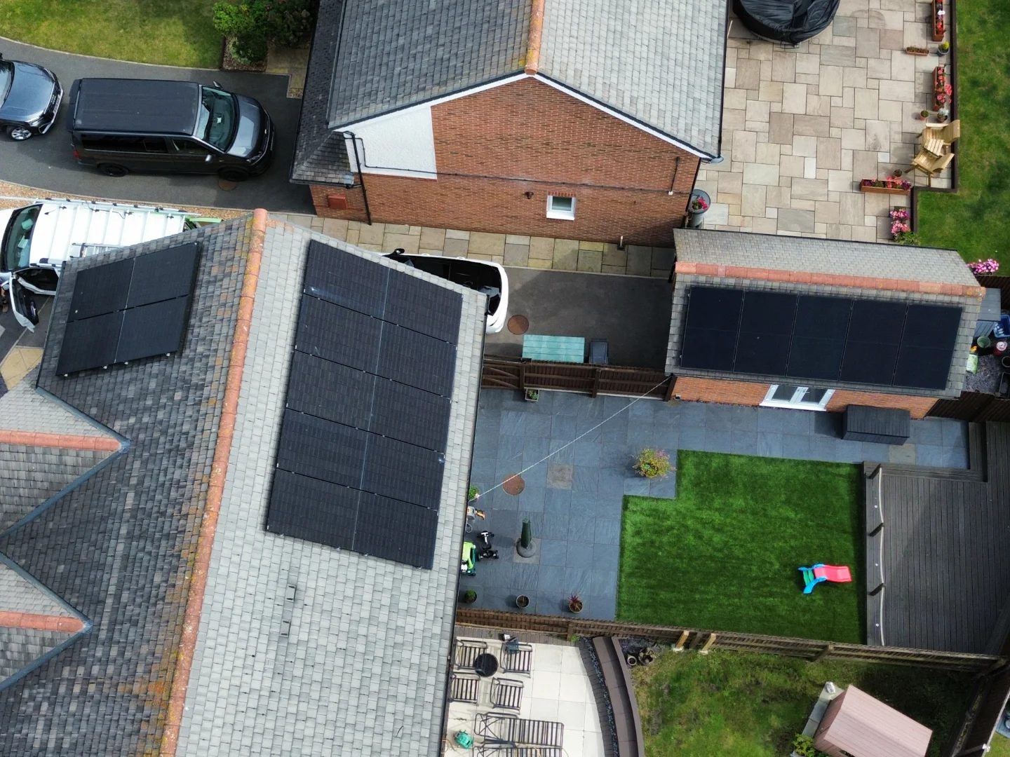 Extended solar arrays across a Buckley home and garage
