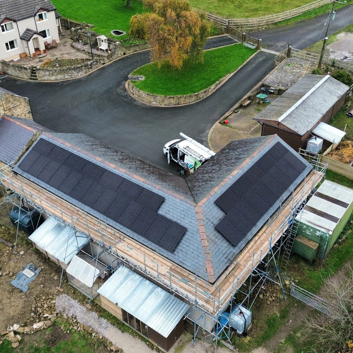 Aerial view of a solar panel installation on a home in Halkyn